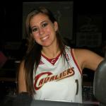 THIS IS LISA, ANOTHER BARTENDER AT JOHNNY MALLOY'S. ALTHOUGH SHE IS WEARING A CAVS JERSEY THIS PICTURE WAS TAKEN ON THE CLEVELAND INDIANS OPENING DAY GAME ON THE TV'S AT MALLOY'S. HEY THE CAVS ARE WINNERS. 