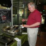 BFB filling up a plates of tacos at the "all you can eat" taco bar. Just one of the many plates that he filled.  