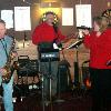 This is a picture of The
PHANTOM BAND at JUST
ONE MORE in 2006 behind WING WAREHOUSE in Gala 
Commons.
DONNIE sat in with us for
quite awhile. We gave him
a couple of beers. 
It was the rebirth of the 
GOODYEAR CHRISTMAS
PARTY!