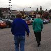 Drumstir and Spike walking
in the rain from the parking
lot across the street from the
Hobrauhaus in Kentucky.