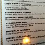 Here is the menu from the Yardarm. Look real close. 
You can see the item 
called Alligator Tail. We 
had an order of that.