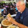 Spike diving into his Cuban Sandwich. 