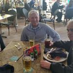 S.B., The Forester, and R. B. having lunch with Fergie, holding the camera, after arriving in Tampa at Bahama Breeze before heading into Clearwater Baech. 