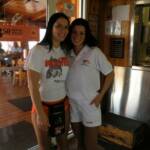Here is Mandy with the Hooters Greeter at the front door. That Mandy gets around!