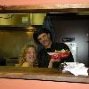 Speaking of hands on, here is JEN back in the kitchen helping out the chef. (Sorry, we didn't get his name. No food for us!)