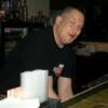 Here is KENNY, the other bartender for that evening. I heard of whistle while you work, but he was doin' a rap or somethin'!