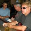 DRUMSTIR in the foreground with BILLY BOB and his son at the inside bar at Jerzee's.