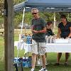 Hacker's has a full bar set 
up on the grass near the driving range for their 
Range Parties. Here is 
BILLY BOB coming back 
to our table after he purchased a can of 
Yuengling. 