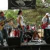 Another picture of the band. Lead guitar, MARIO, r
ockin' out in the white shirt.  