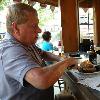 Another pic of DRUMSTIR cutting into the steak. 
He took one bite, and said 
that it was over-cooked. 
Go back and look at the 
pic of the Prime Rib by 
itself! It doesn't look like 
it was cooked enough to me. But they took it back and 
gave him another.