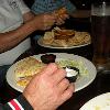 This is a pic of SPIKE (Background). and R. B. 
enjoying their meal of
Nacho Chips and Salsa 
and Chicken Quesadillas
respectively.    