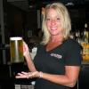 Here is TRISH, one of our 
fave bartenders presenting 
me with my first beer of the Legends Mug Club.