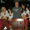And here is the Birthday Boy, the BIG BOI (Dougie), with a few of the Tilted Kilt girls. They are posing with him for a pic before they take him into the dining room for their Happy Birthday ritual.