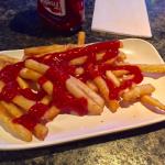 Johnny J's offers Free Fries on Wednesdays if you sit at the bar. 