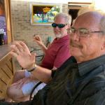 Here's Jimbo (Waving) with
S. B. We always sit at the 
huge bar out on the patio at 
The Galaxy for their Patio 
Parties with a Live Band!  