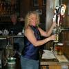 Another picture of TRICIA working hard at the taps 
behind the bar. 