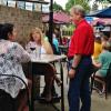 Speaking of radio station 
WONE, here is DJ TK O'Grady
talking with a couple of the 
girls out on the patio.