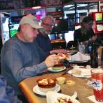 The Specials at Legends on 
this Wednesday were 1/2 Price Apps, Chicken Soup, and
$1 off Wines.
I ordered the soup, but they brought me Garden Vegetable
soup. It was good so I ate it. 
Then all of the rest of the Geezers who were there ordered some. Here are the copy cats eating theIrs.  