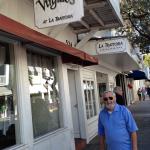 This picture was sent anonymously by someone
who believes that it may be 
our long lost Geezer, the Candyman. 
It may be coincidental that he 
is standing in front of a 
restaurant called Virgilio's? 