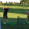 Another guy out on the grass
hittin' to the music on the Range.
