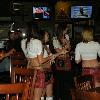 I was a little late on this shot.
The Kilt Girls were helping
a young man celebrate his
birthday.
When they find out someone 
is celebrating one they all
gather around and announce
it. In this case is was for a 
baby boy! Cute.