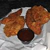 As we have said previously Johnny J's Special on
Wednesday nites is 1/2 Off
Appetizers. 
The most popular item on the
menu are the Chicken Tenders.
You can get them Fried or 
Grilled. Here is a pic of the 
Fried variety.  