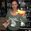 Here is STORMY with another
type of Martini on $3 Martini
Nite! 
We were giving her a hard time because of her Mich
State T-Shirt. Her family
attended Mich State, and she lost a swimming scholarship 
because of an injury!  OK!