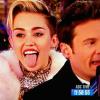 MILEY CYRUS doing her 
thang with RYAN SEACREST! 