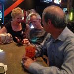 Here are R. B. in the foreground, and BILLY BOB
in the background talking to one of GAYLE'S friends.

us.