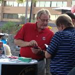 Another shot of TK O'GRADY
from WKDD signing people 
up for the valuable drawings
that are held out on the Patio.