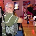 Here is S. B. modeling his Murse. Nah, it's Krisko's
Purse that she asked him
to hand to her.