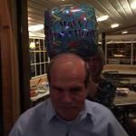 You can see my co-conspirator, Gayle, in the background posiitioning the Happy Birthday baloon behind
R. B.'s head. NO, it was not his B-Day, but it will be in a 
couple of weeks on Sept 12.