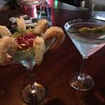 This is a perfect pair. A Jumbo
Shrimp Cocktail at Half Off, and a $3 Martini.