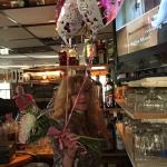 Karen placing her B-Day
Balloons and Flowers that 
Vicki got her behind the bar.