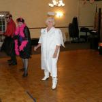 Here are some of the costumed crowd doing a line dance to some of the live music that nite.