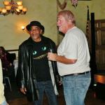 On the right is the drummer for
the Phantom Band, Big Daddy. He is conversing with one of his associates from Goodyear, 
Victor Head. Victor sat in with
the Pahntom Band on a few 
numbers including Mustang Sally. He currently is a member of the Howrad Street Blues Band.  