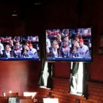 There are TV's and tables 
all over the main resturant. Here are two tables near the corner of the room in front of the bar that have TV's above them. Natrually they both had
The Indians game on.