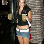 Here is KATIE heading out to the Patio delivering two "man-sized" brewksies.