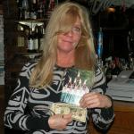 Karen posing with the B-Day card that the Geezers got for her. You can tell that she is really excited! Doh!