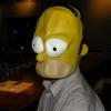 Here is a profile of R.B. when he first put on the HOMER SIMPSON mask that I bought him for a joke. 