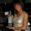 another picture of CHRISTIE holding her fave bottle of spirits. 