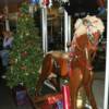 A pic of their Christmas tree and the hobby horse that they have on display at the front of the main bar. 