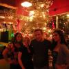 As with the photo of Hanky Panky, the previous pic of Jen, and her staff with the flash, did not show the lights to their fullest. Here is one of the group showing off the lights on the tree behind them.   