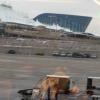 Afriend of S. B. and me (J.Bo),
Mardi Allen, lives in Texas. She is a Big Ohio State fan. When they beat Alabama they could go  to the Championship game, and she she wanted to go. She she asked me and I went.
We are both big football fans This is picture of Denver Airport and new Hotel from bar.  

