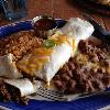 My choice from the Menu. 
A beef burrito, with fried rice, and refried beans. 
It was excellent.