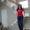 Here is Mardi coming down the steps of her home with E-Ticket in hand for the Big Game.