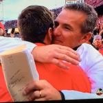 Coach Meyer hugging his kicker who missed a FG in regulation to send the game to 
overtime. What a guy!