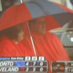 I bet we look cool on TV with our matching ponchos and umbrella!
