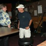 Here we have LARRY (L), and HANK, one of the Phatom Band guitar players talking before the Big performance. There i (J.BO) am trying to tune my guitars.