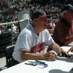AND HERE IS FORMER CLEVELAND INDIANS PITCHER, AND HALL OF FAMER, BOB FELLER, SIGNING AUTOGRAPHS. HE IS 90 YEARS OLD, AND STILL GOING STRONG!
